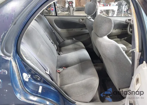 2001 Toyota Corolla Le z USA, uszkodzony, nr VIN 2T1BR12E41C445877